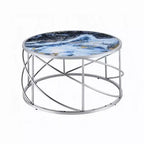 Table basse ronde piètement ouvert chromé, marbre synthétique bleu