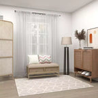 Banc de rangement contemporain en lin beige avec cadre en bois capitonné